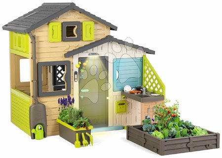 Case set - Casetta degli Amici con cucinetta accanto al giardino fiorito sotto la lampada Friends House Evo Playhouse Smoby